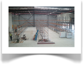 The mezanine level you see on the left of this picture houses a small office area and static shelving for filing.